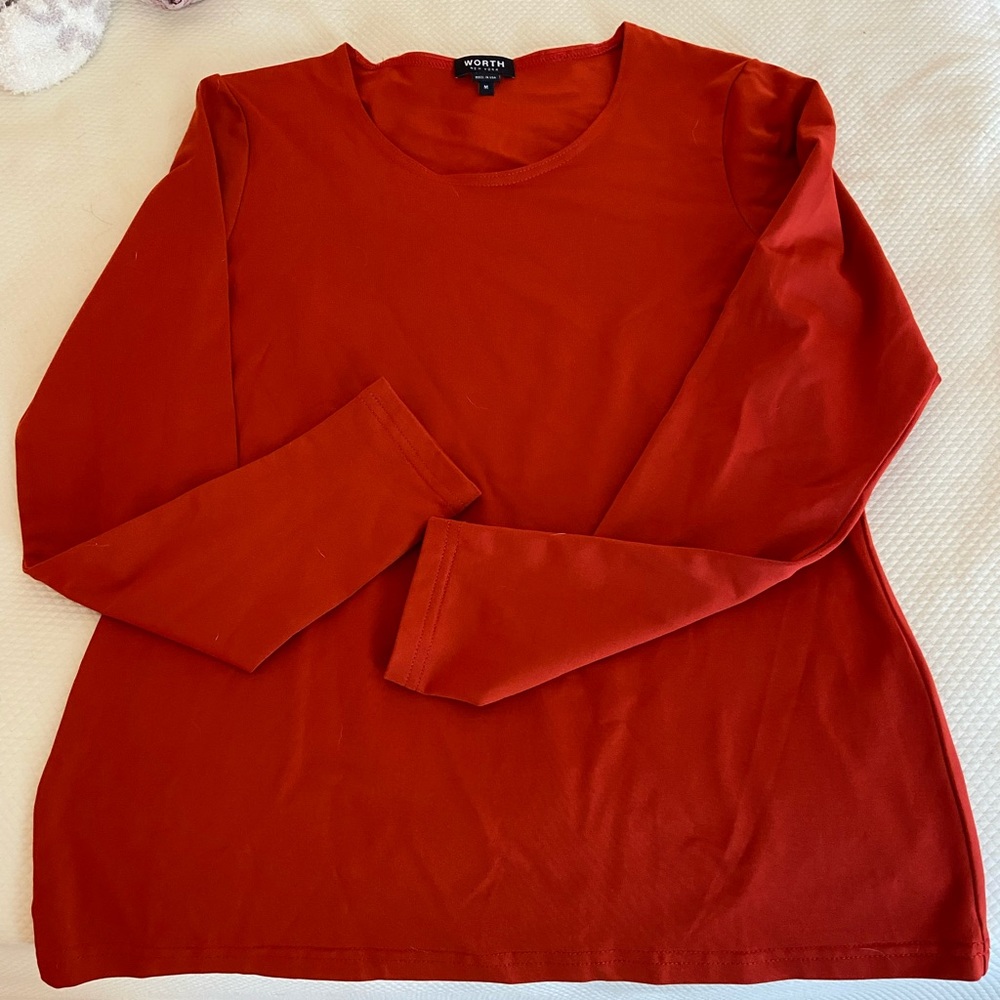 Deep orange knit top from Worth.  Size medium.  Never worn